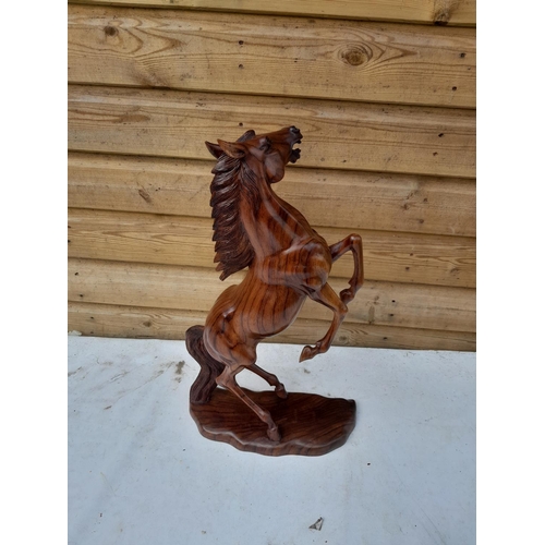 29 - 20th century finely executed South East Asian carved Rosewood figure of a prancing horse