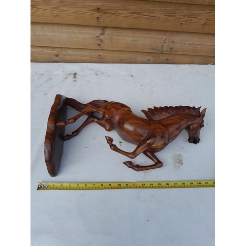 29 - 20th century finely executed South East Asian carved Rosewood figure of a prancing horse