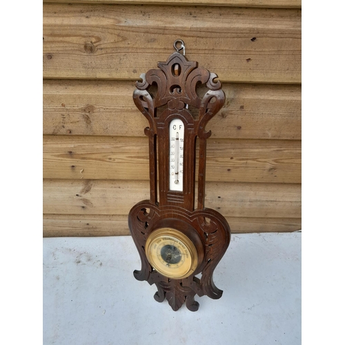 48 - Vintage wall barometer with thermometer in carved oak case