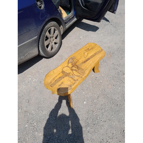 123 - Rustic carved ash coffee table, horse and pony theme possibly by Guy Solf