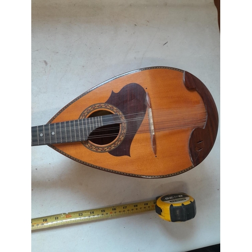 126 - Vintage Suzuki Violin Company bowl back 8 string mandolin, heavily inlaid in good order with soft ca... 