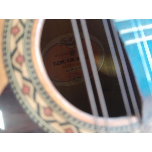 126 - Vintage Suzuki Violin Company bowl back 8 string mandolin, heavily inlaid in good order with soft ca... 