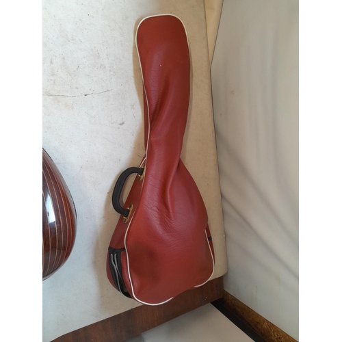 126 - Vintage Suzuki Violin Company bowl back 8 string mandolin, heavily inlaid in good order with soft ca... 