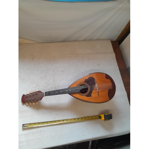 126 - Vintage Suzuki Violin Company bowl back 8 string mandolin, heavily inlaid in good order with soft ca... 