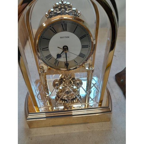 129 - Rhythm clock and carved wood wall sconce