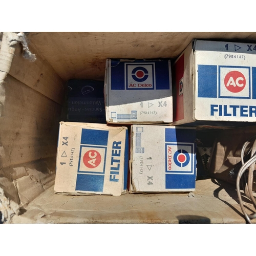 139 - Box of garage equipment : possible vintage motorcycle and car interest, filters etc. some boxed