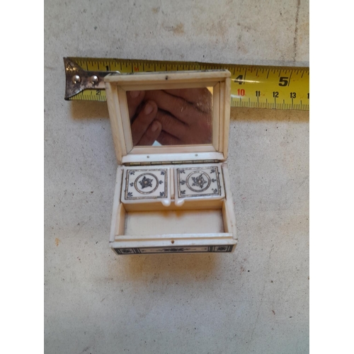 145 - Early 20th century Colonial bone vanity case inlaid with silver, the hinged lid opens to reveal full... 
