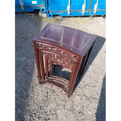 159 - Nest of four carved Chinese stained hardwood tables