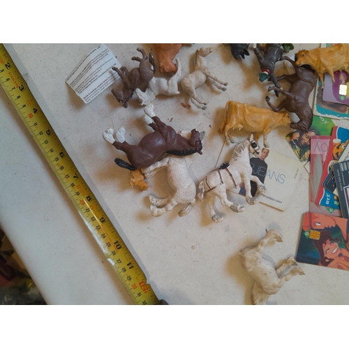 163 - Various plastic Britains and other toys, phone cards