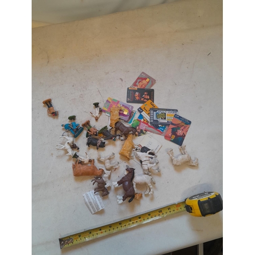 163 - Various plastic Britains and other toys, phone cards