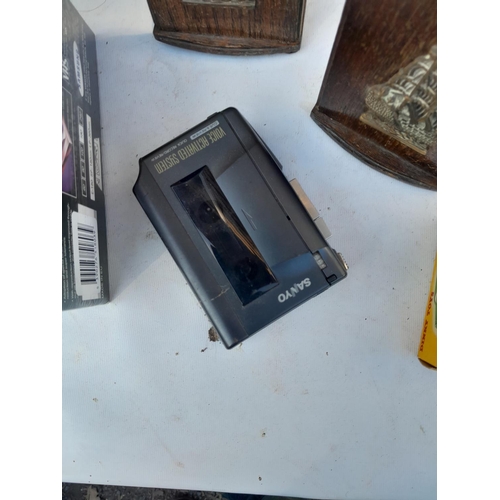222 - Sealed video cassette tapes, oak bookshelf, Sanyo Walkman no battery cover etc.