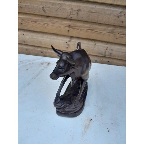 75 - Vintage South East Asian well executed carved rosewood figure modelled as a Cow 32 cms x 27 cms