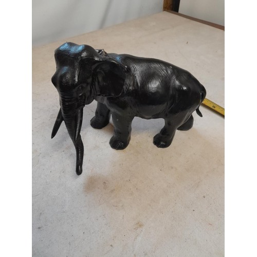 90 - Scarce early 20th century painted spelter table lighter / striker modelled as an elephant, with stri... 