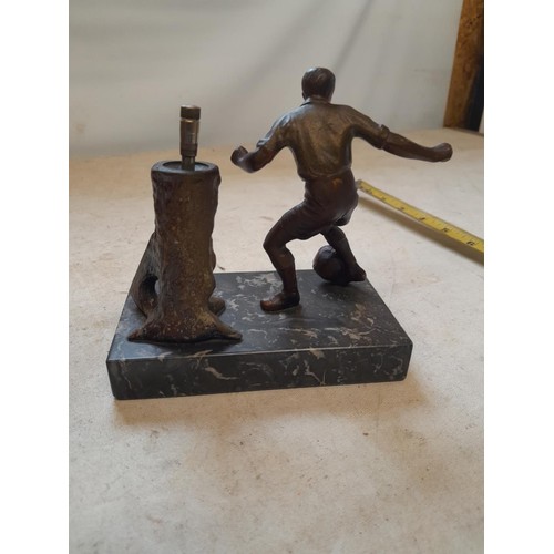 91 - An early 20th century table lighter modelled as a footballer, cold painted mixed metal , tree trunk ... 