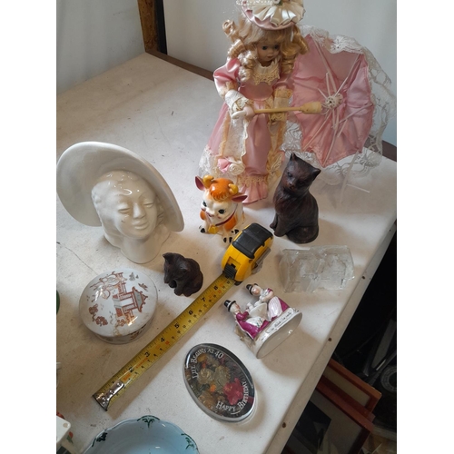 9 - Decorative china : Damaged coloured Dartmouth glug jug, collectors doll, lamp, resin cats, glass pap... 