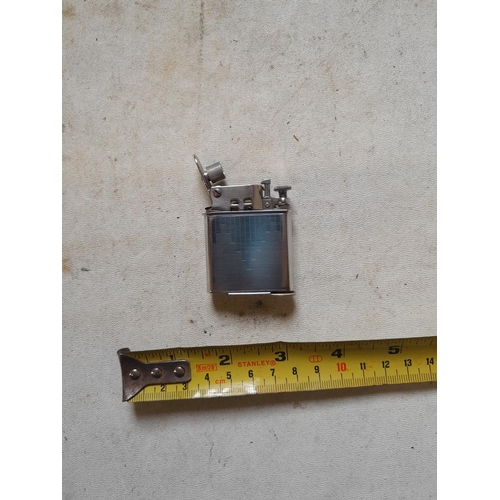 123 - Abdulla Art Deco petrol lighter, working but flint tube cover screw missing