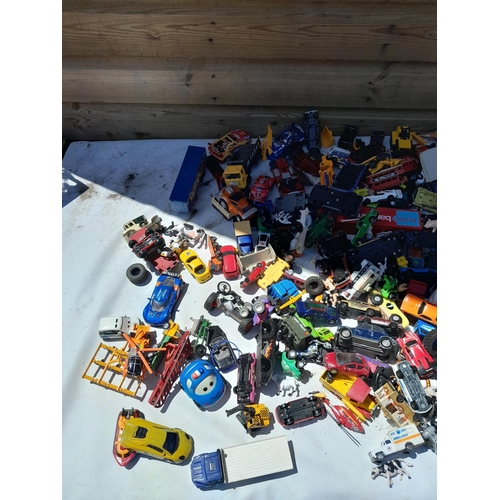 69 - Box of assorted play worn die cast toy cars, various makers and dates