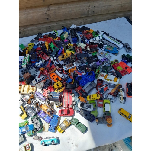 72 - Box of assorted play worn die cast toy cars, various makers and dates