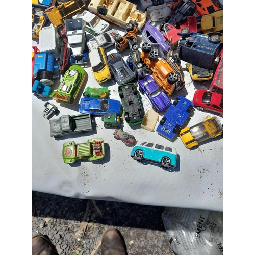 72 - Box of assorted play worn die cast toy cars, various makers and dates