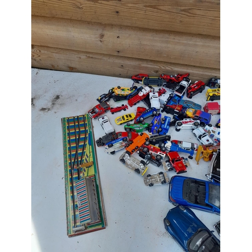 90 - Assorted play worn die cast toy cars, differing makers and dates