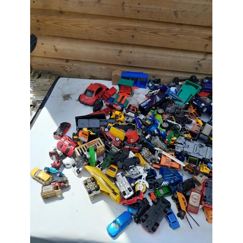 92 - Assorted play worn die cast toy cars, differing makers and dates