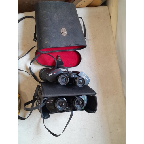 99 - 2 x pairs of binoculars : Boots Admiral III 12 x 50,  Swift Belmont 10 x 50 &