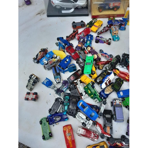 103 - Assorted play worn die cast toy cars, differing makers and dates