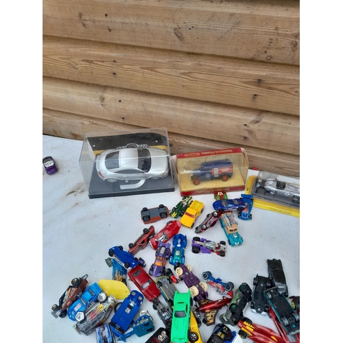 103 - Assorted play worn die cast toy cars, differing makers and dates