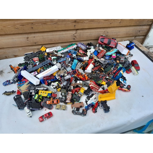 105 - Assorted play worn die cast toy cars, differing makers and dates