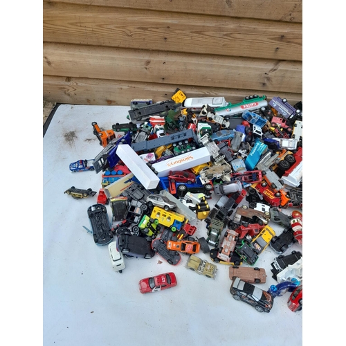 105 - Assorted play worn die cast toy cars, differing makers and dates