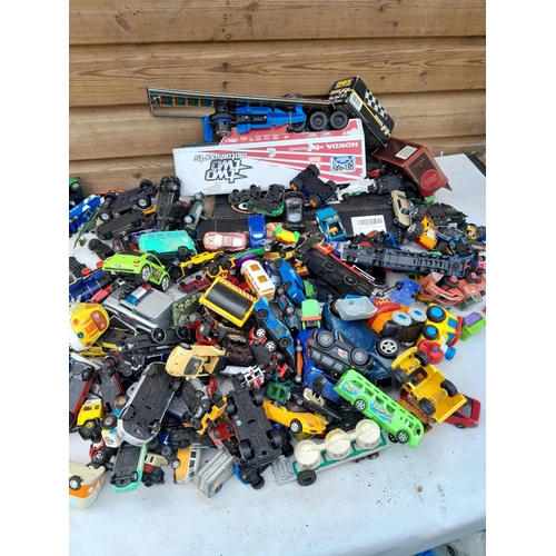 106 - Assorted play worn die cast toy cars, differing makers and dates