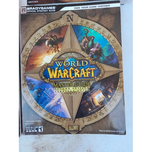 146 - 4 x World Of Warcraft softback books