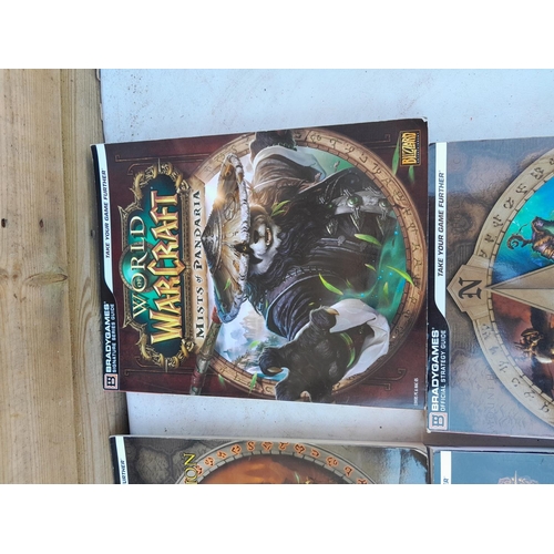 146 - 4 x World Of Warcraft softback books