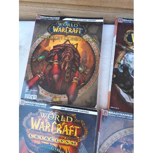 146 - 4 x World Of Warcraft softback books