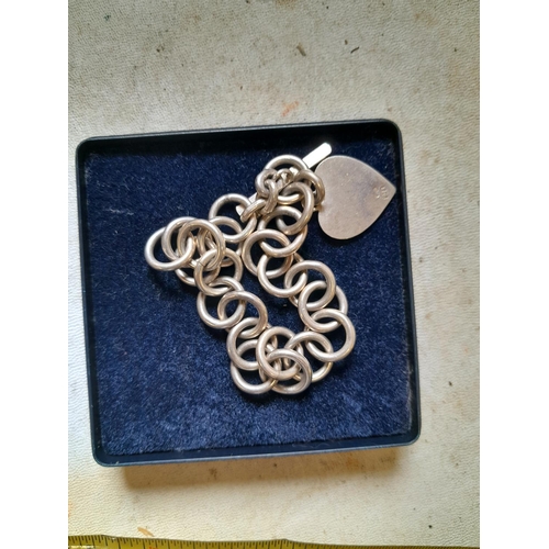 204 - Silver open link bracelet with heart pendant