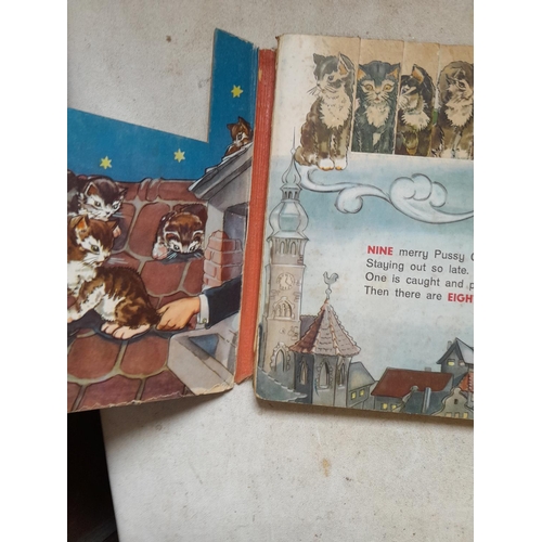 215 - Various vintage childrens books some with damages, scribbling etc.