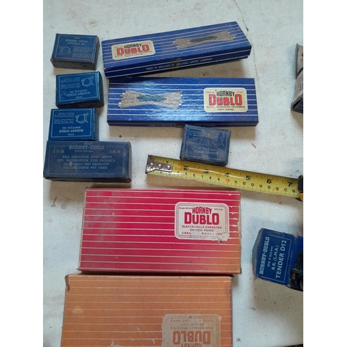 229 - Vintage Hornby Dublo railway track, some boxed accessories and tenders etc.