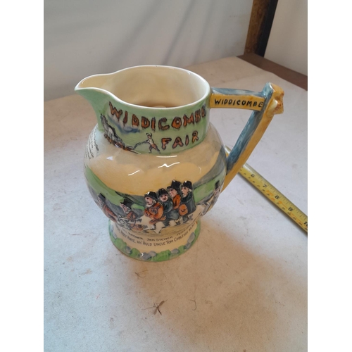 291 - Crown Devon Widdecombe musical jug, in working order and good condition