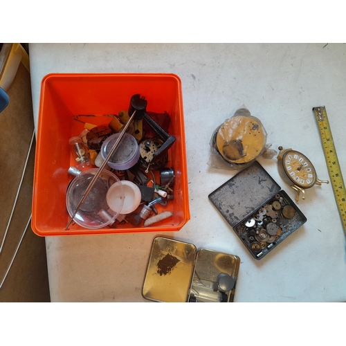 296 - Tub of watch and clock spares