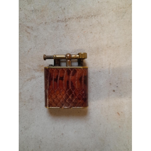 149 - Dunhill Unique lighter with lift arm action with lizard skin decoration Pat 143762 from the mid 1920... 