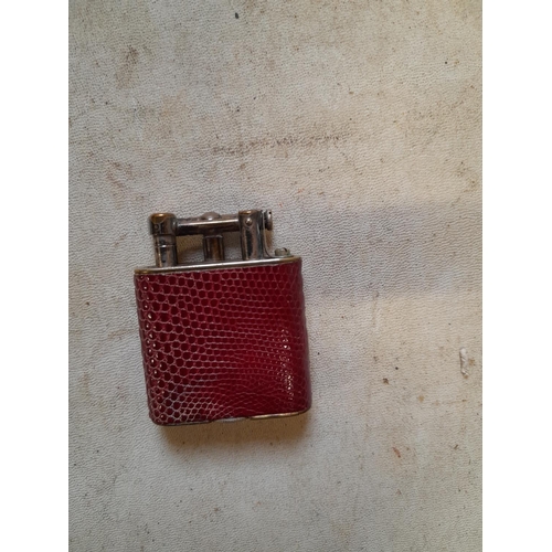 155 - Dunhill Unique lighter from the mid 1920s with red lizard skin decoration and lift arm action Pat 14... 