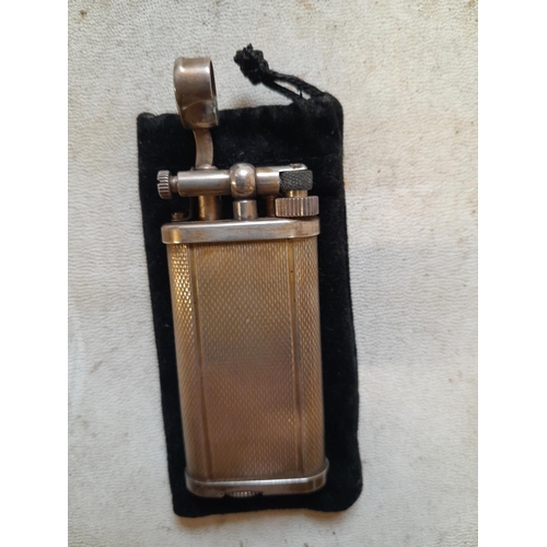 157 - Dunhill silver plated gas lighter in pouch Serial No. 417893