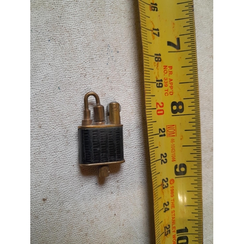 188 - Novelty miniature lighter, not working