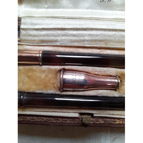 195 - Early 20th century Alfred Dunhill cigarette holder in three pieces made of tortoiseshell with 9 ct g... 