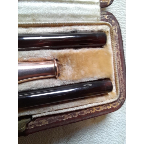 195 - Early 20th century Alfred Dunhill cigarette holder in three pieces made of tortoiseshell with 9 ct g... 