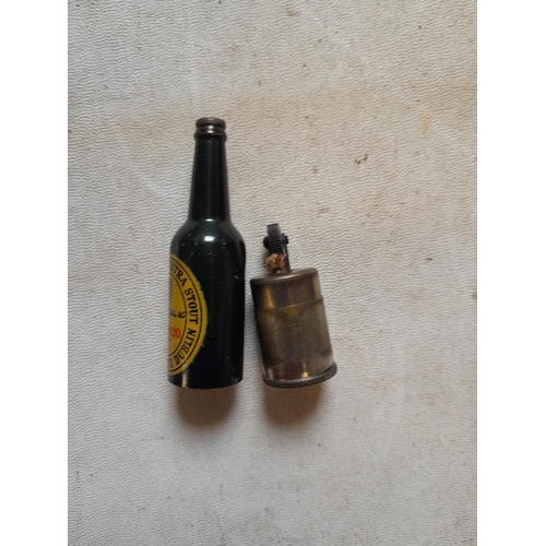 197 - Vintage advertising interest : Guinness advertising bottle lighter made in Germany