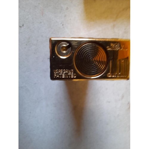 210 - Alfred Dunhill gold plated bark finish Rollagas lighter in original box of issue with original paper... 