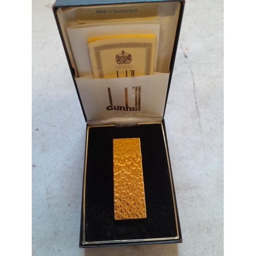 210 - Alfred Dunhill gold plated bark finish Rollagas lighter in original box of issue with original paper... 