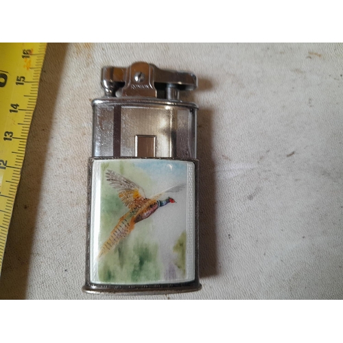 223 - Scarce Ronson pocket lighter in silver and guilloche enamel jacket decorated with pheasant