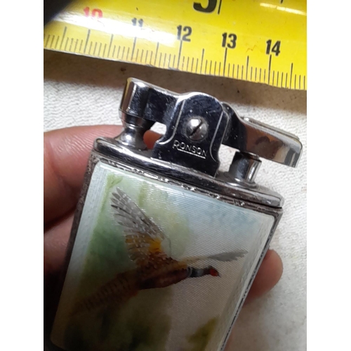 223 - Scarce Ronson pocket lighter in silver and guilloche enamel jacket decorated with pheasant